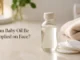 Bottle of baby oil on a bathroom counter used for facial skincare